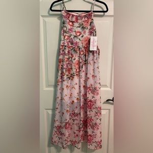 Girl’s pink floral maxi dress, key hole closure on back with a sash.